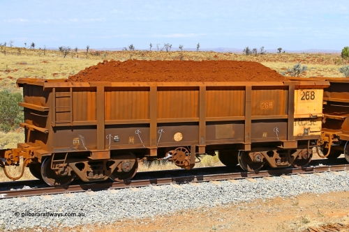 0268 170729 0235
Robe River ore waggon 268, built by Nippon Sharyo Nihon, fixed coupler handbrake side loaded view at the 103 km, between Maitland Siding and the Fortescue River on the Deepdale line. July 29, 2017.
Keywords: 268;Nippon-Sharyo-Nihon;Robe-ore-waggon;