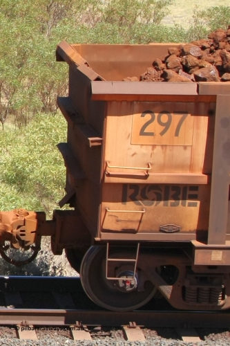 0297 081209 0116
Robe River ore waggon 297, built by Nippon Sharyo Nihon, rotary coupler end plate view at the 7 km location just south of Cape Lambert yard. December 9, 2008.
Keywords: 297;Nippon-Sharyo-Nihon;Robe-ore-waggon;