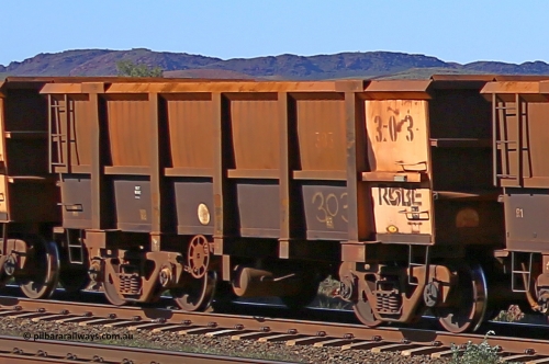 0303 160727 0965
Robe River ore waggon 303, built by Nippon Sharyo Nihon, rotary coupler end handbrake side empty view at Harding Siding on the Cape Lambert line, July 27, 2016.
Keywords: 303;Nippon-Sharyo-Nihon;Robe-ore-waggon;