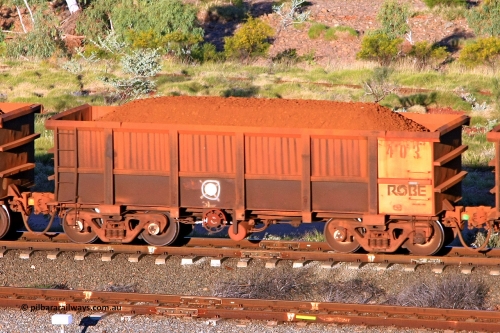 0403 110602 1654
Robe River ore waggon 403, built by Tomlinson Steel WA, rotary coupler end handbrake side loaded view at the 71 km, Western Creek on the Deepdale line. June 2, 2011.
Keywords: 403;Tomlinson-Steel-WA;Robe-ore-waggon;