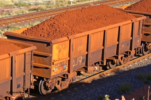 0419 210322 9721
Robe River ore waggon 419, built by Tomlinson Steel WA, rotary coupler end non-handbrake side loaded view at the 17 km on the Cape Lambert line, March 22, 2021.
Keywords: 419;Tomlinson-Steel-WA;Robe-ore-waggon;