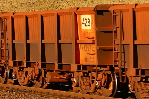 0428 060722 7589
Robe River ore waggon 428, built by Tomlinson Steel WA, rotary coupler end handbrake side empty view, at the 11.7 km, Cape Lambert. July 22, 2006.
Keywords: 428;Tomlinson-Steel-WA;Robe-ore-waggon;
