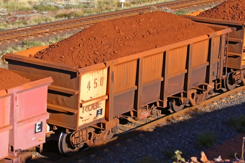 0450 210322 9720
Robe River ore waggon 450, built by Tomlinson Steel WA, rotary coupler end non-handbrake side loaded view at the 17 km on the Cape Lambert line, March 22, 2021.
Keywords: 450;Tomlinson-Steel-WA;Robe-ore-waggon;