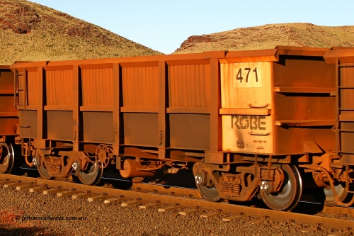 0471 060722 7636
Robe River ore waggon 471, built by Tomlinson Steel WA, rotary coupler end handbrake side empty view, at the 11.7 km, Cape Lambert. July 22, 2006.
Keywords: 471;Tomlinson-Steel-WA;Robe-ore-waggon;