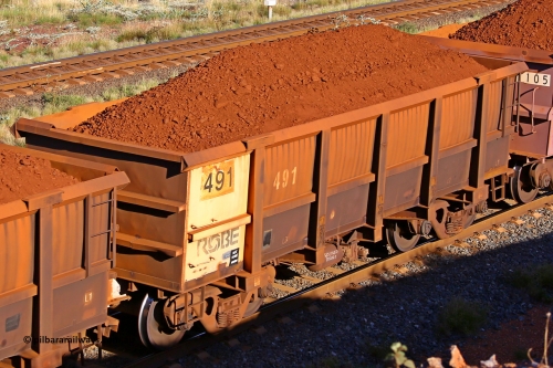 0491 210322 9722
Robe River ore waggon 491, built by Tomlinson Steel WA, rotary coupler end non-handbrake side loaded view at the 17 km on the Cape Lambert line, March 22, 2021.
Keywords: 491;Tomlinson-Steel-WA;Robe-ore-waggon;