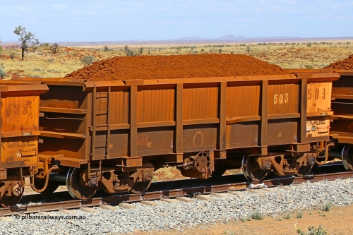 0503 170729 0269
Robe River ore waggon 503, built by Tomlinson Steel WA, fixed coupler handbrake side loaded view at the 103 km, between Maitland Siding and the Fortescue River on the Deepdale line. July 29, 2017.
Keywords: 503;Tomlinson-Steel-WA;Robe-ore-waggon;