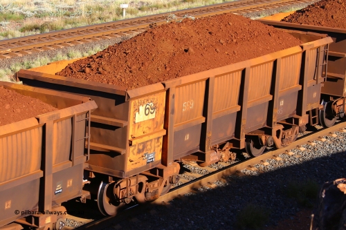 0569 210322 9783
Robe River ore waggon 569, built by Tomlinson Steel WA, rotary coupler end non-handbrake side loaded view at the 17 km on the Cape Lambert line, March 22, 2021.
Keywords: 569;Tomlinson-Steel-WA;Robe-ore-waggon;