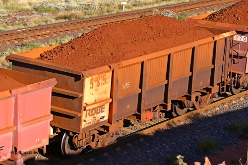 0585 210322 9763
Robe River ore waggon 585, built by Tomlinson Steel WA, rotary coupler end non-handbrake side loaded view at the 17 km on the Cape Lambert line, March 22, 2021.
Keywords: 585;Tomlinson-Steel-WA;Robe-ore-waggon;