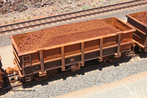 0602 160306 1469
Robe River ore waggon 602, built by Tomlinson Steel WA, fixed coupler handbrake side loaded view, at the 45 km, Harding Siding on the Cape Lambert line. March 6, 2016.
Keywords: 602;Tomlinson-Steel-WA;Robe-ore-waggon;