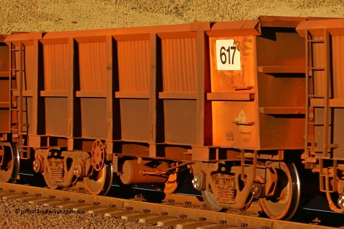 0617 060722 7615
Robe River ore waggon 617, built by Tomlinson Steel WA, rotary coupler end handbrake side empty view, at the 11.7 km, Cape Lambert. July 22, 2006.
Keywords: 617;Tomlinson-Steel-WA;Robe-ore-waggon;
