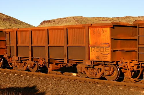 0666 060722 7624
Robe River ore waggon 666, built by Tomlinson Steel WA, rotary coupler end handbrake side empty view, at the 11.7 km, Cape Lambert. July 22, 2006.
Keywords: 666;Tomlinson-Steel-WA;Robe-ore-waggon;