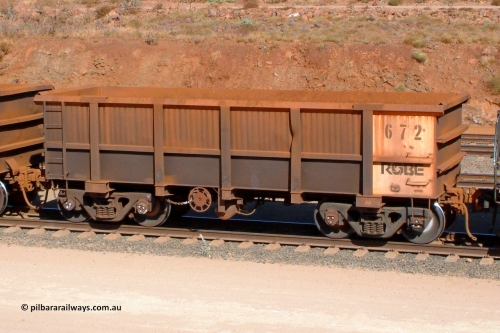 0672 041014 154200
Robe River ore waggon 672, built by Tomlinson Steel WA, rotary coupler end handbrake side empty view, Cape Lambert yard. 1542 hours, October 14, 2004.
Keywords: 672;Tomlinson-Steel-WA;Robe-ore-waggon;
