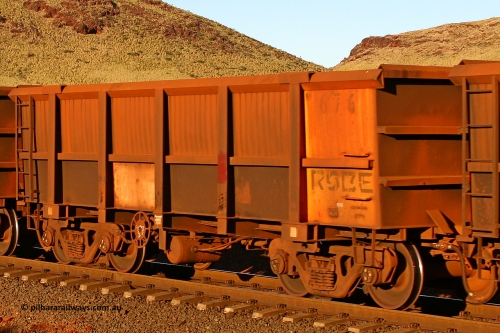 0676 060722 7632
Robe River ore waggon 676, built by Tomlinson Steel WA, rotary coupler end handbrake side empty view, at the 11.7 km, Cape Lambert. July 22, 2006.
Keywords: 676;Tomlinson-Steel-WA;Robe-ore-waggon;