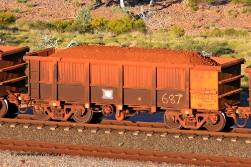 0687 110602 1697
Robe River ore waggon 687, built by Tomlinson Steel WA, rotary coupler end handbrake side loaded view at the 71 km, Western Creek on the Deepdale line. June 2, 2011.
Keywords: 687;Tomlinson-Steel-WA;Robe-ore-waggon;