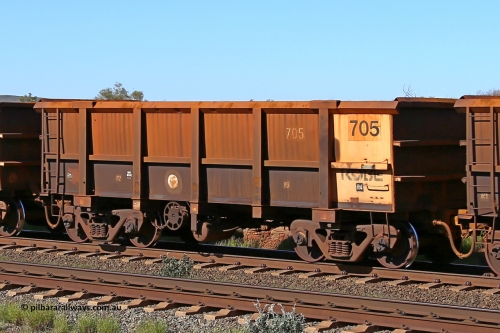 0705 160727 0965
Robe River ore waggon 705, built by Tomlinson Steel WA, rotary coupler end handbrake side empty view at Harding Siding on the Cape Lambert line, July 27, 2016.
Keywords: 705;Tomlinson-Steel-WA;Robe-ore-waggon;