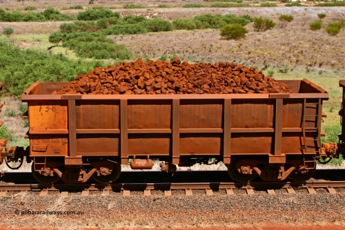 0738 061209 8193
Robe River ore waggon 738, built by Tomlinson Steel WA, non-handbrake side loaded view at the 7 km location just south of Cape Lambert yard. December 9, 2006.
Keywords: 738;Tomlinson-Steel-WA;Robe-ore-waggon;