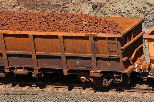 0762 160306 1659
Robe River ore waggon 762, built by Centurion Industries WA, fixed coupler non-handbrake side loaded partial view showing drop rib end, at the 45 km, Harding Siding on the Cape Lambert line. March 6, 2016.
Keywords: 762;Centurion-Industries-WA;Robe-ore-waggon;
