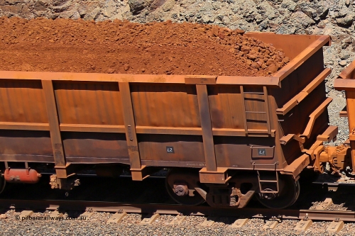 0765 160306 1606
Robe River ore waggon 765, built by Centurion Industries WA, fixed coupler non-handbrake side loaded view showing drop rib end, at the 45 km, Harding Siding on the Cape Lambert line. March 6, 2016.
Keywords: 765;Centurion-Industries-WA;Robe-ore-waggon;