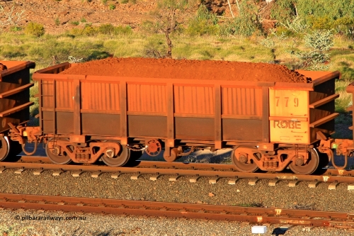 0779 110602 1650
Robe River ore waggon 779, built by Centurion Industries WA, rotary coupler end handbrake side loaded view at the 71 km, Western Creek on the Deepdale line. June 2, 2011.
Keywords: 779;Centurion-Industries-WA;Robe-ore-waggon;
