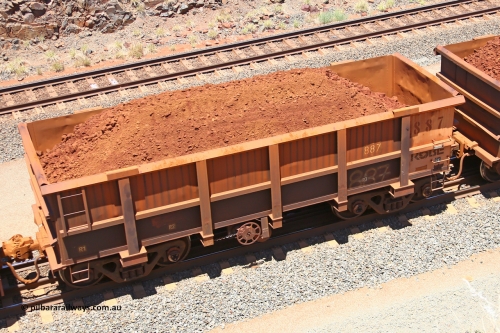 0887 160306 1466
Robe River ore waggon 887, built by Centurion Industries WA, fixed coupler handbrake side loaded view, at the 45 km, Harding Siding on the Cape Lambert line. March 6, 2016.
Keywords: 887;Centurion-Industries-WA;Robe-ore-waggon;