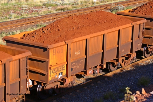 0945 210322 9777
Robe River ore waggon 945, built by Centurion Industries  WA, rotary coupler end non-handbrake side loaded view at the 17 km on the Cape Lambert line, March 22, 2021.
Keywords: 945;Centurion-Industries-WA;Robe-ore-waggon;