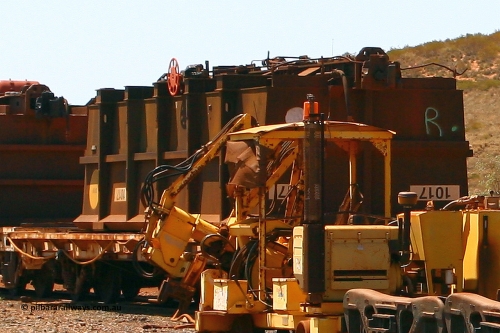 1017 070909 0667
Robe River ore waggon 1017, built by Bradken Rail Qld in December 2005, fixed coupler handbrake side upside down on flat waggon, Cape Lambert. September 9, 2007.
Keywords: 1017;Bradken-Rail-Qld;Robe-ore-waggon;