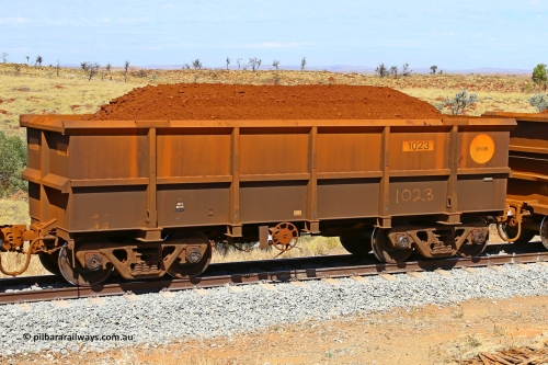 1023 170729 0236
Robe River ore waggon 1023, built by Bradken Rail Qld in January 2006, fixed coupler handbrake side loaded view at the 103 km, between Maitland Siding and the Fortescue River on the Deepdale line. July 29, 2017.
Keywords: 1023;Bradken-Rail-Qld;Robe-ore-waggon;