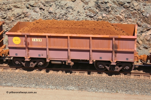1039 160306 1593
Robe River ore waggon 1039, built by Bradken Rail Qld in April 2012, fixed coupler non-handbrake side loaded view, at the 45 km, Harding Siding on the Cape Lambert line. March 6, 2016.
Keywords: 1039;Bradken-Rail-Qld;Robe-ore-waggon;
