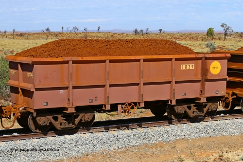 1039 170729 0210
Robe River ore waggon 1039, built by Bradken Rail Qld in April 2012, fixed coupler handbrake side loaded view at the 103 km, between Maitland Siding and the Fortescue River on the Deepdale line. July 29, 2017.
Keywords: 1039;Bradken-Rail-Qld;Robe-ore-waggon;