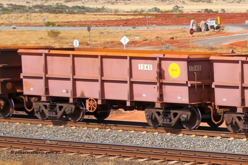 1040 141124 6811
Robe River ore waggon 1040, built by Bradken Rail Qld in March 2012, rotary coupler end handbrake side empty view at the 25 km at Arches Siding on the Cape Lambert line. November 24, 2014.
Keywords: 1040;Bradken-Rail-Qld;Robe-ore-waggon;