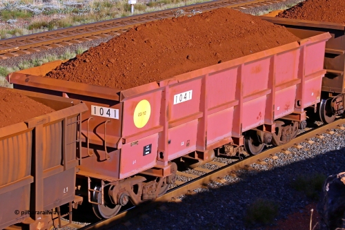 1041 210322 9700
Robe River ore waggon 1041, built by Bradken Rail Qld in March 2012, rotary coupler end non-handbrake side loaded view, at the 17 km on the Cape Lambert line, March 22, 2021.
Keywords: 1041;Bradken-Rail-Qld;Robe-ore-waggon;
