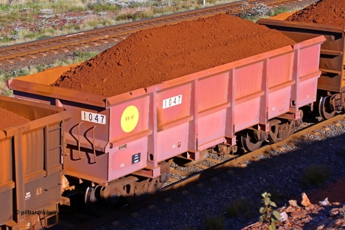 1047 210322 9682
Robe River ore waggon 1047, built by Bradken Rail Qld in March 2012, rotary coupler end non-handbrake side loaded view, at the 17 km on the Cape Lambert line, March 22, 2021.
Keywords: 1047;Bradken-Rail-Qld;Robe-ore-waggon;