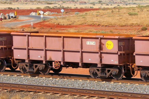 1074 141124 6811
Robe River ore waggon 1074, built by Bradken Rail Qld in March 2012, rotary coupler end handbrake side empty view at the 25 km at Arches Siding on the Cape Lambert line. November 24, 2014.
Keywords: 1074;Bradken-Rail-Qld;Robe-ore-waggon;