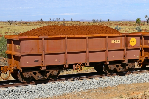 1086 170729 0215
Robe River ore waggon 1086, built by Bradken Rail Qld in May 2012, fixed coupler handbrake side loaded view at the 103 km, between Maitland Siding and the Fortescue River on the Deepdale line. July 29, 2017.
Keywords: 1086;Bradken-Rail-Qld;Robe-ore-waggon;