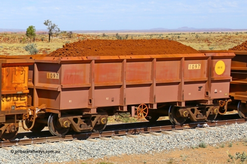 1097 170729 0255
Robe River ore waggon 1097, built by Bradken Rail Qld in May 2012, fixed coupler handbrake side loaded view at the 103 km, between Maitland Siding and the Fortescue River on the Deepdale line. July 29, 2017.
Keywords: 1097;Bradken-Rail-Qld;Robe-ore-waggon;