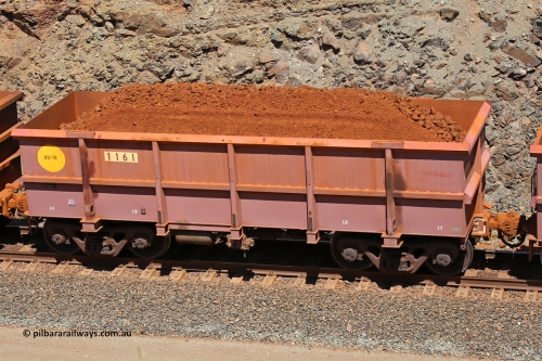 1161 160306 1623
Robe River ore waggon 1161, built by Bradken Rail Qld in May 2012, fixed coupler non-handbrake side loaded view, at the 45 km, Harding Siding on the Cape Lambert line. March 6, 2016.
Keywords: 1161;Bradken-Rail-Qld;Robe-ore-waggon;
