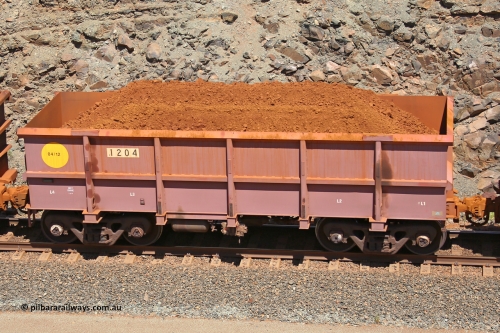 1204 160306 1560
Robe River ore waggon 1204, built by Bradken Rail Qld in April 2012, fixed coupler non-handbrake side loaded view, at the 45 km, Harding Siding on the Cape Lambert line. March 6, 2016.
Keywords: 1204;Bradken-Rail-Qld;Robe-ore-waggon;