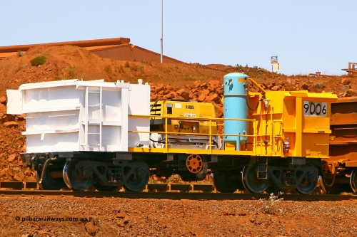 9006 070909 0655
Robe River compressor waggon 9006 on the lead of a Deepdale rake going through the car dumper at Cape Lambert. Fitted with an Atlas Copco XAS 85 compressor, fuel tank and air receiver. This waggon is a modified Tomlinson Steel built ore waggon. September 9, 2007.
Keywords: 9006;robe-compressor-waggon;