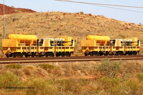 IC20 070908 0594
Robe River compressor waggon sets IC 20 with air receiver and IC 21 with two Ingersoll Rand air compressors and IC 22 with receiver and IC 23 with compressors. These waggons are ballasted to 100 tonnes each and are modified ore waggons and used on the pooled fleet rakes that come from HIY [Yandicoogina] and West Angelas mines. Cape Lambert yard, August 8 2007.
Keywords: IC20;IC21;IC22;IC23;robe-compressor-waggon;