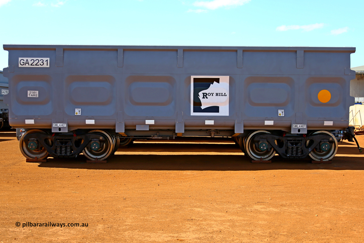 150314 7762
Wedgefield, following the delivery of Roy Hill's 1196 new GA type CCK138 model waggons, they were stored in several site whilst awaiting for enough track to be laid to allow delivery onto rail. GA2231 side view showing the logo and details, the yellow circle designates the rotary coupler end. March 14. 2015.
Keywords: GA-type;GA2231;CSR-Yangtze;CCK138