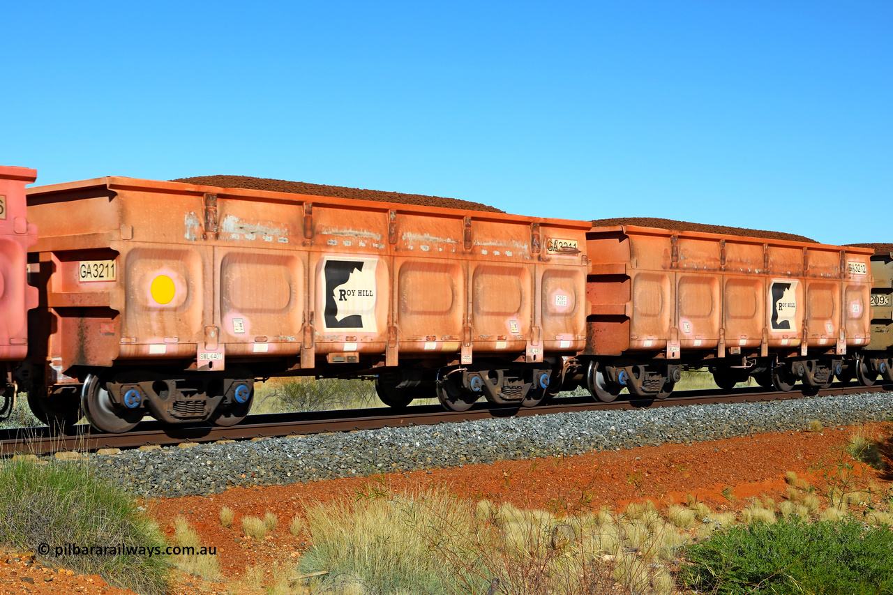 250501 0393
At the 88.448 km, just south of HPPL crossing loop on the Roy Hill line, loaded Roy Hill waggon pair GA 3211 - GA 3212, built in China by CRRC Yangtze as an CCK138 model ore waggon in Breast Cancer Awareness pink livery. May 1, 2025.
Keywords: GA-type;GA3211-GA3212;CRRC-Yangtze;CCK138;