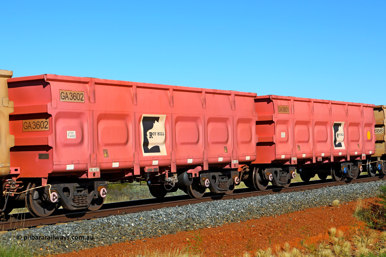 250501 0434
At the 88.448 km, just south of HPPL crossing loop on the Roy Hill line, empty Roy Hill waggon pair GA 3601 - GA 3602, built in China by CRRC Yangtze as an CCK138 model ore waggon in Breast Cancer Awareness pink livery. May 1, 2025.
Keywords: GA-type;GA3601-GA3602;CRRC-Yangtze;CCK138;