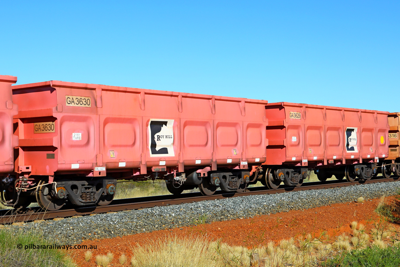 250501 0446
At the 88.448 km, just south of HPPL crossing loop on the Roy Hill line, empty Roy Hill waggon pair GA 3629 - GA 3630, built in China by CRRC Yangtze as an CCK138 model ore waggon in Breast Cancer Awareness pink livery. May 1, 2025.
Keywords: GA-type;GA3629-GA3630;CRRC-Yangtze;CCK138;