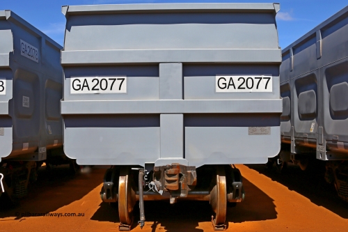 150314 7767
Wedgefield, following the delivery of Roy Hill's 1196 new GA type CCK138 model waggons, they were stored in several site whilst awaiting for enough track to be laid to allow delivery onto rail. GA2077 end view showing fixed end, only the even numbered waggons, or control waggon, has an uncoupling lever, the odd numbered, or slave waggons do not. March 14. 2015.
Keywords: GA-type;GA2077;CSR-Yangtze;CCK138;