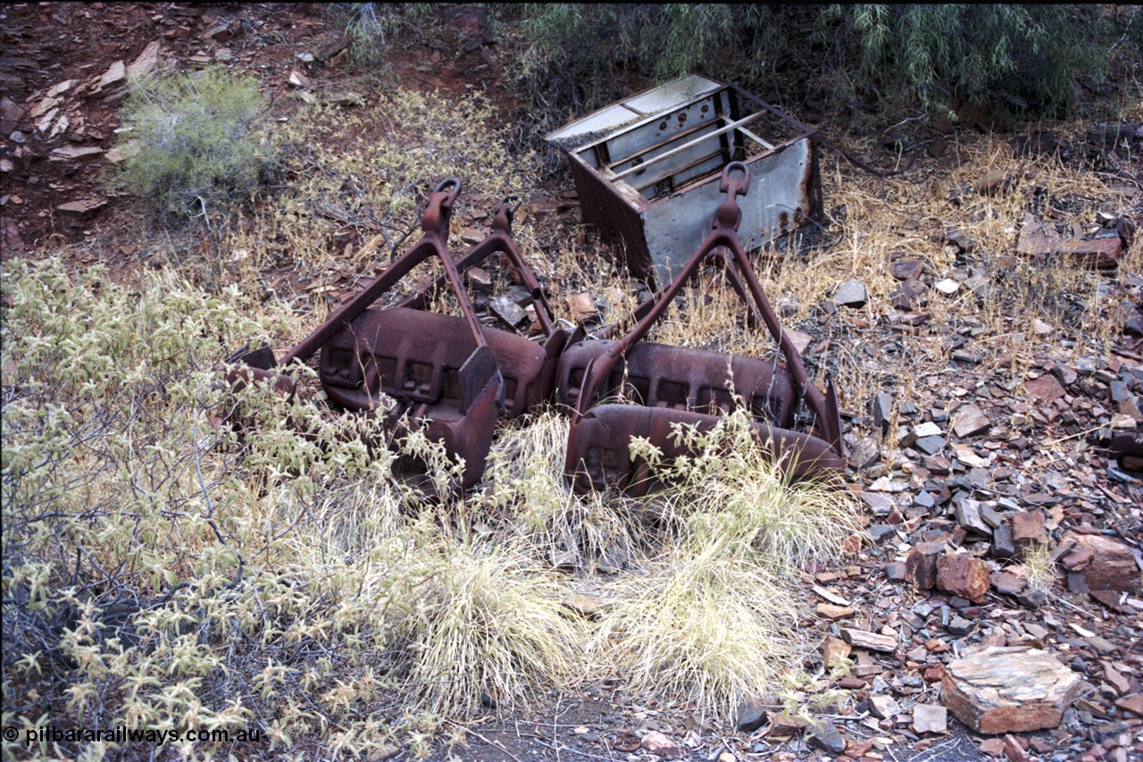 194-03
Wittenoom Gorge, Colonial Mine, asbestos mining remains, pile of four scoop buckets.
