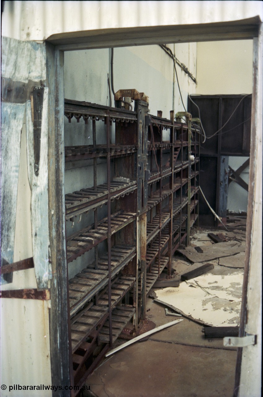 194-12
Wittenoom Gorge, Colonial Mine, asbestos mining remains, view of the CEAG cap lamp charging racks.
