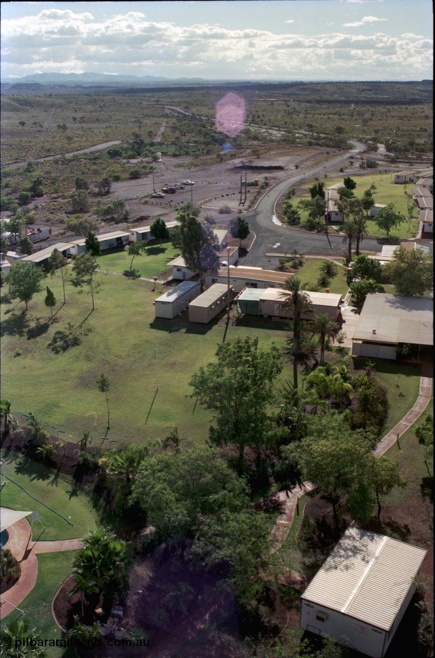 194-32
Yandi campsite for Henry Walker operated iron ore mine owned and managed by BHP, view of camp are from man cage on Kato 50 tonne hydraulic crane.
