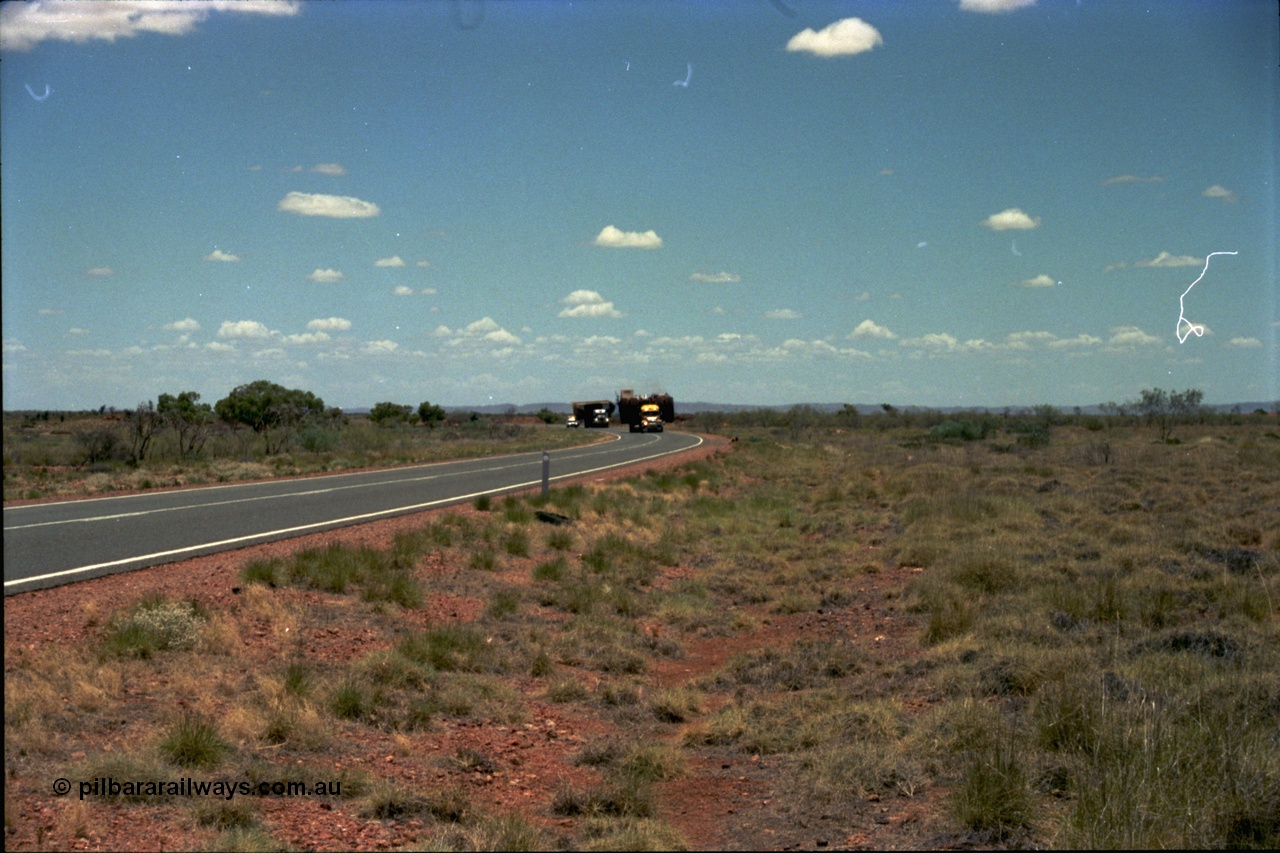 195-03
Great Northern Highway, oversize load of dump truck and dump body.
