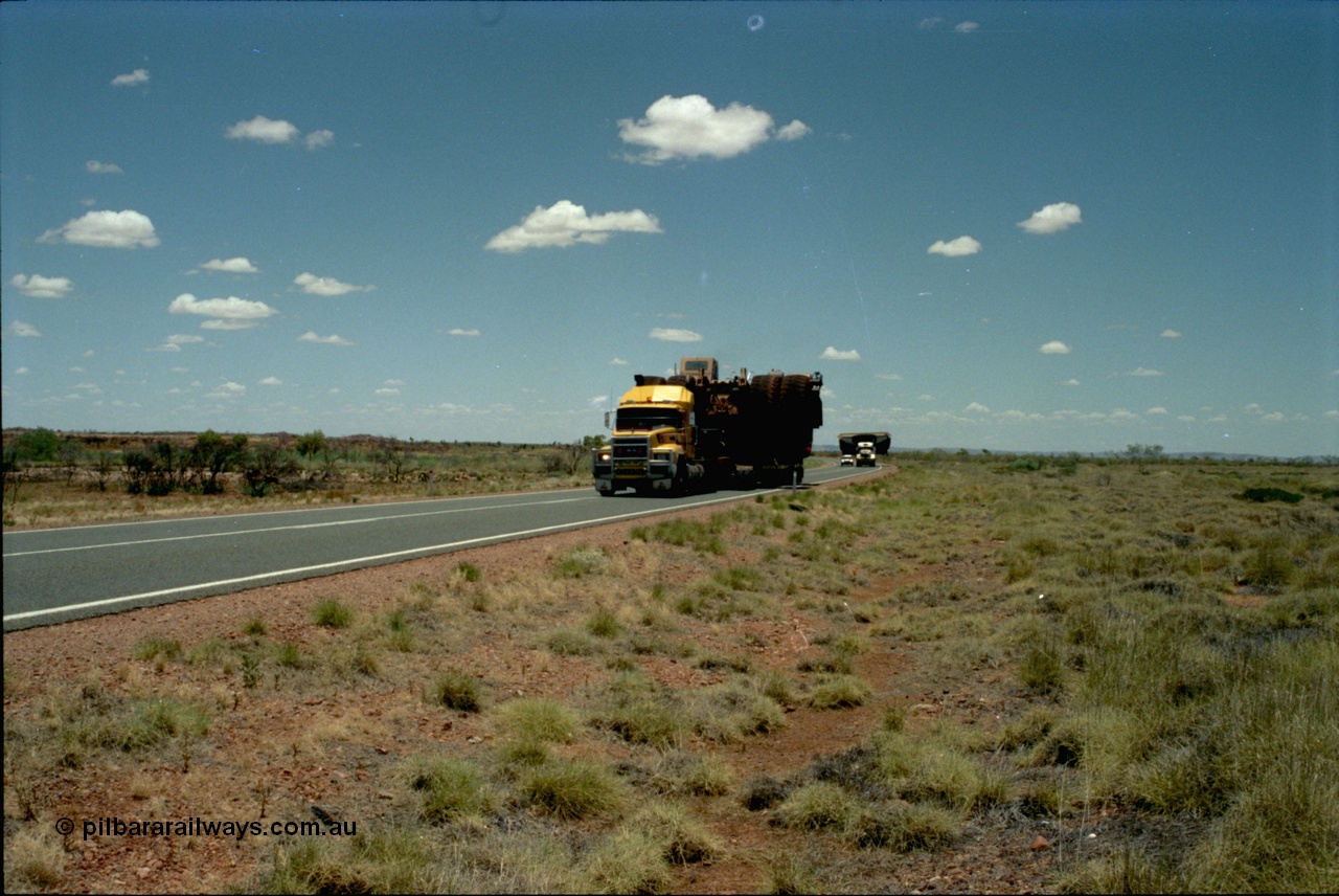 195-04
Great Northern Highway, oversize load of dump truck and dump body.
