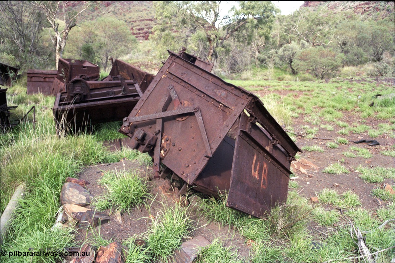 196-20
Wittenoom Gorge, Gorge Mine area, asbestos mining remains, view inside of side opening ore waggon, shows how much ore the waggons could carry.
